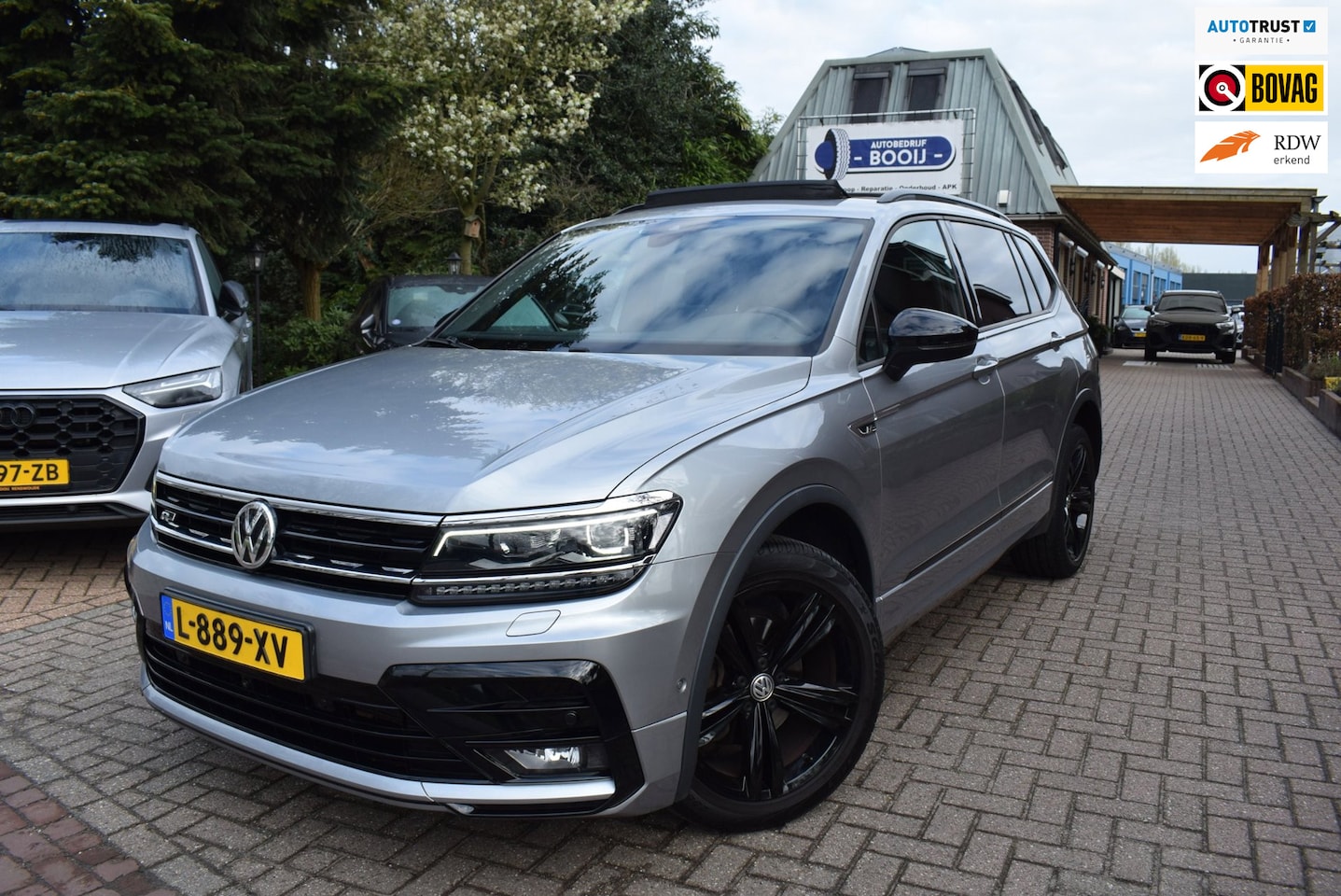 Volkswagen Tiguan Allspace - 1.5 TSI R-LINE/7 PERS/ AUTOM/PANO DAK/ADAP CRUISE/NAVI/AIRCO-ECC/CARPLAY/TREKH/PDC V+A/CAM - AutoWereld.nl