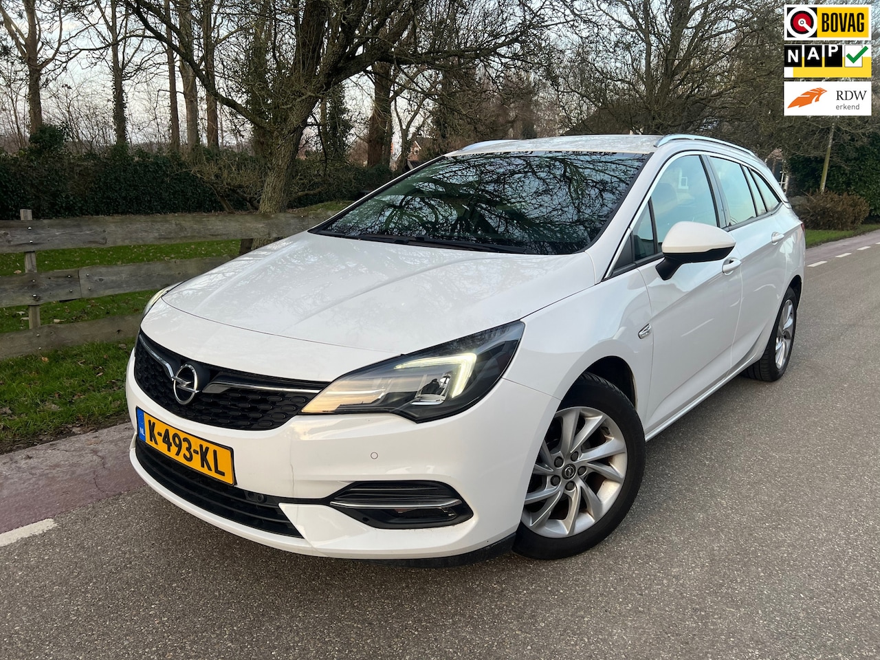 Opel Astra Sports Tourer - 1.2 Business Elegance Camera, Navi - AutoWereld.nl