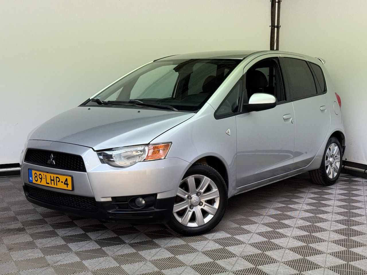 Mitsubishi Colt - 1.3 Edition Two 5-drs Airco LM15" 1e Eigenaar - AutoWereld.nl
