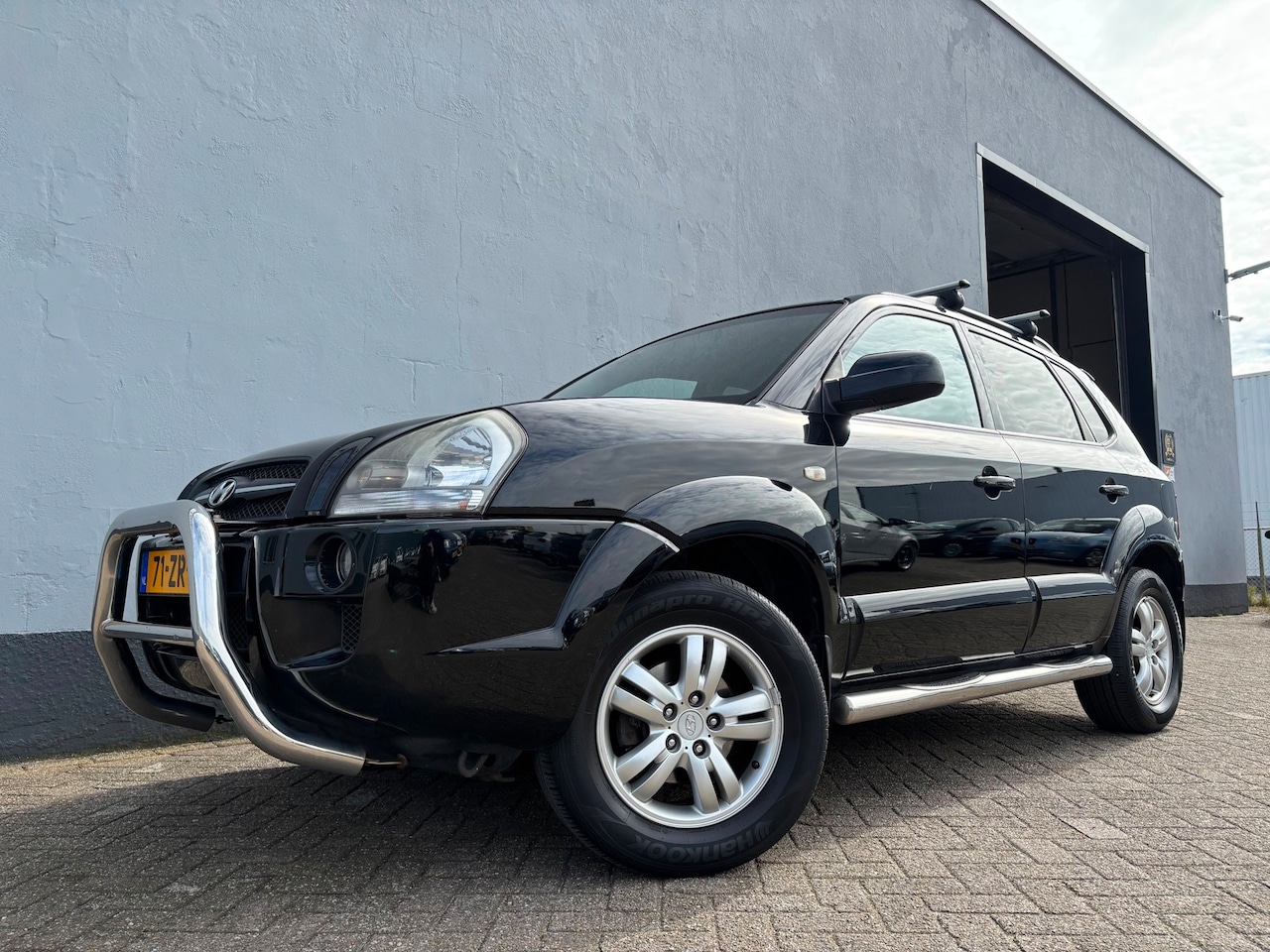 Hyundai Tucson - 2.0i Style Supreme - BULL BARS - LEDER - AutoWereld.nl