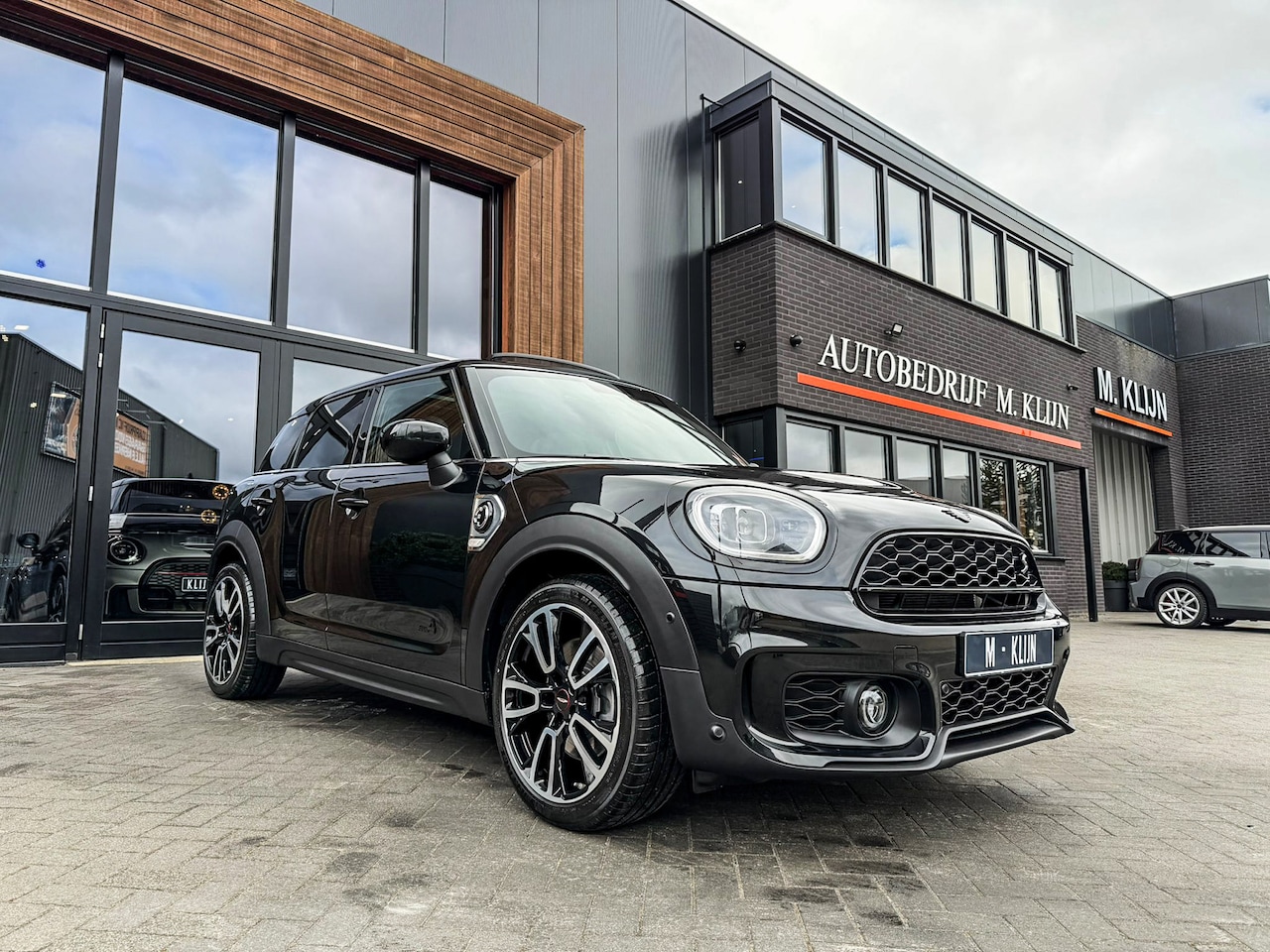 MINI Countryman - Mini Cooper S E ALL4 John Cooper Works 220pk/Pano/Memory/HK/Camera/Btw - AutoWereld.nl