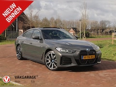 BMW i4 - eDrive40 84 kWh | M-Pakket | Schuifdak | Camera | Dravitgrau metallic | NL-Auto |