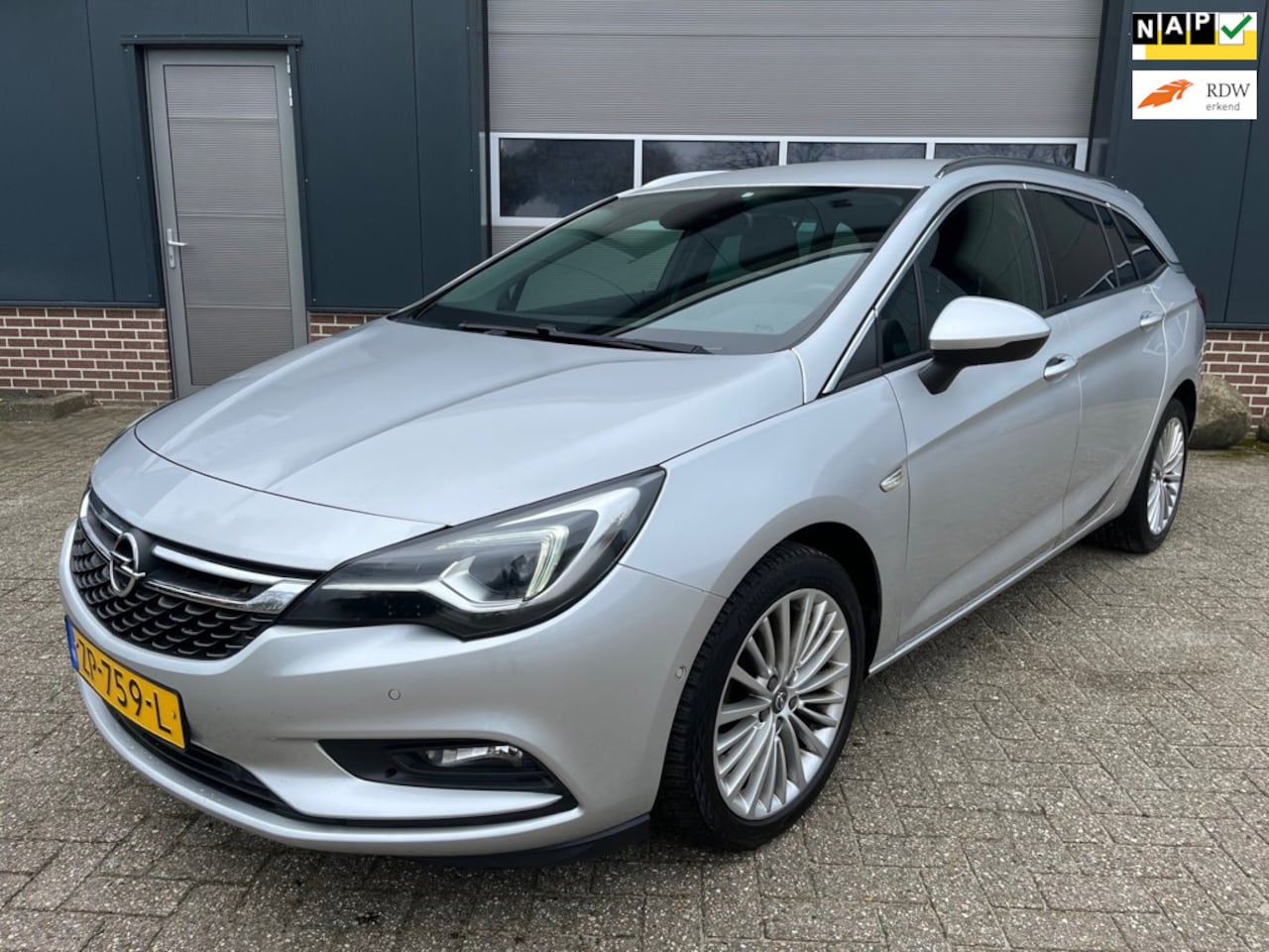 Opel Astra Sports Tourer - 1.4 Turbo Innovation-Camera-Carplay-Radar-Cruise-NAP! - AutoWereld.nl