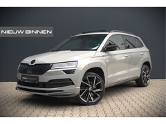 Skoda Karoq - 1.5 TSI ACT Sportline Business | Panoramadak | Stoelverwarming | Stuurverwarming | Canton