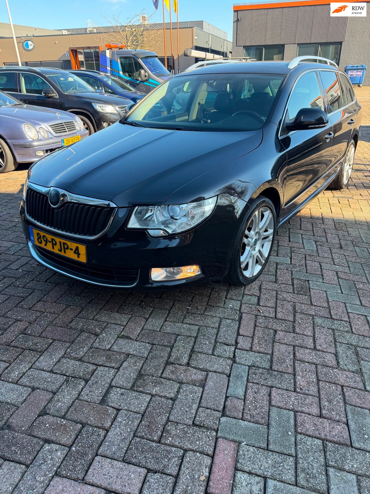 Skoda Superb Combi - 1.8 TSI Automaat Ambition Business Line panorama - AutoWereld.nl