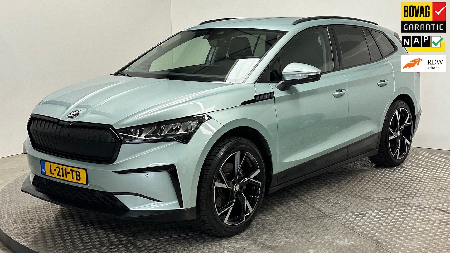 Skoda Enyaq iV - 60 stoelverwarming navigatie parkeersensoren trekhaak carplay android automaat - AutoWereld.nl