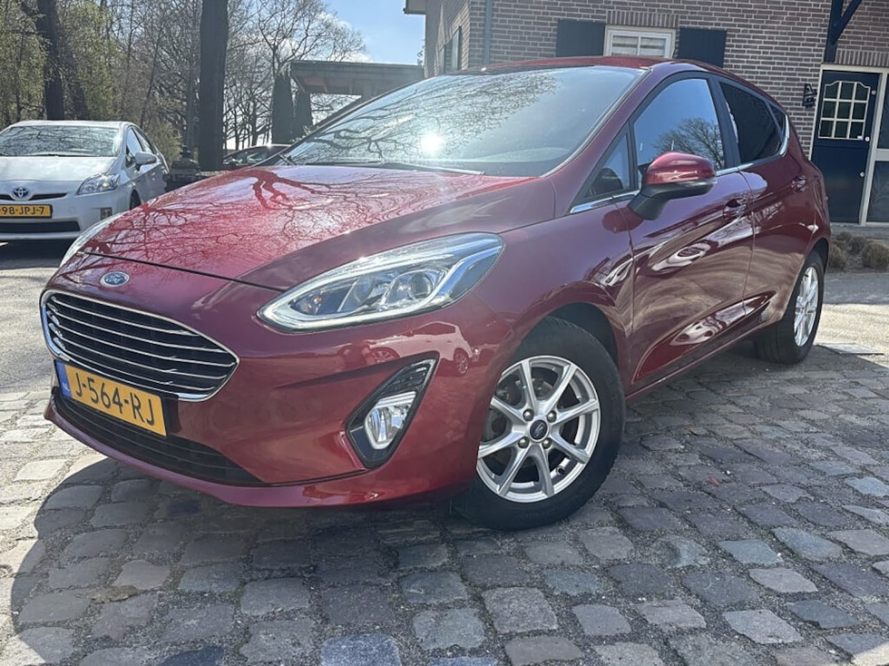 Ford Fiesta - 1.0 95pk Titanium ecc,navigatie,pdc,cruise,lmv,dglas,led - AutoWereld.nl