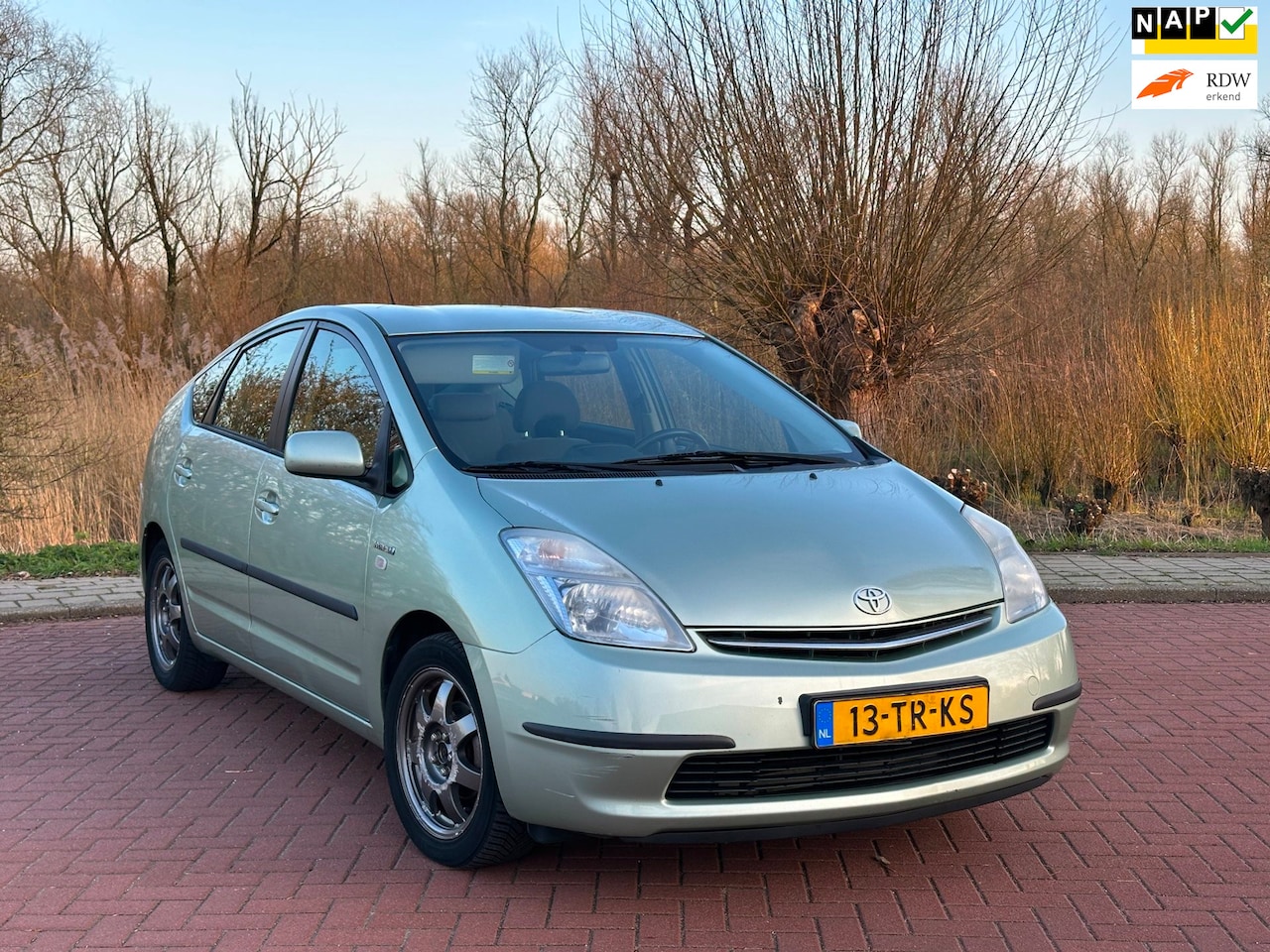 Toyota Prius - 1.5 VVT-i NAP/CLIMA - AutoWereld.nl