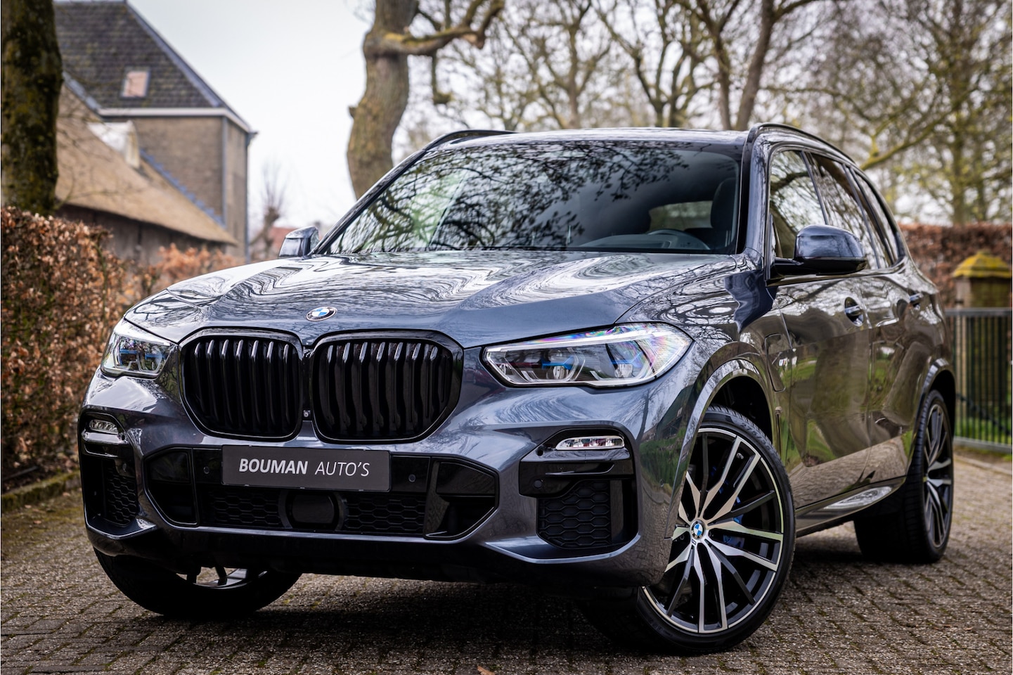 BMW X5 - xDrive45e M Sport Sky Lounge Laser Soft Close 22" Vierwielbesturing Harman Kardon - AutoWereld.nl