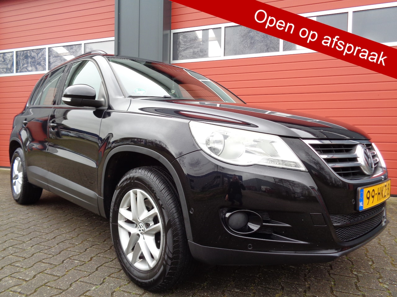 Volkswagen Tiguan - 1.4 TSI Comfort&Design 150PK Airco Cruise LMV 6-BAK Pano-Dak NL-Auto Trekhaak Max. trekgew - AutoWereld.nl