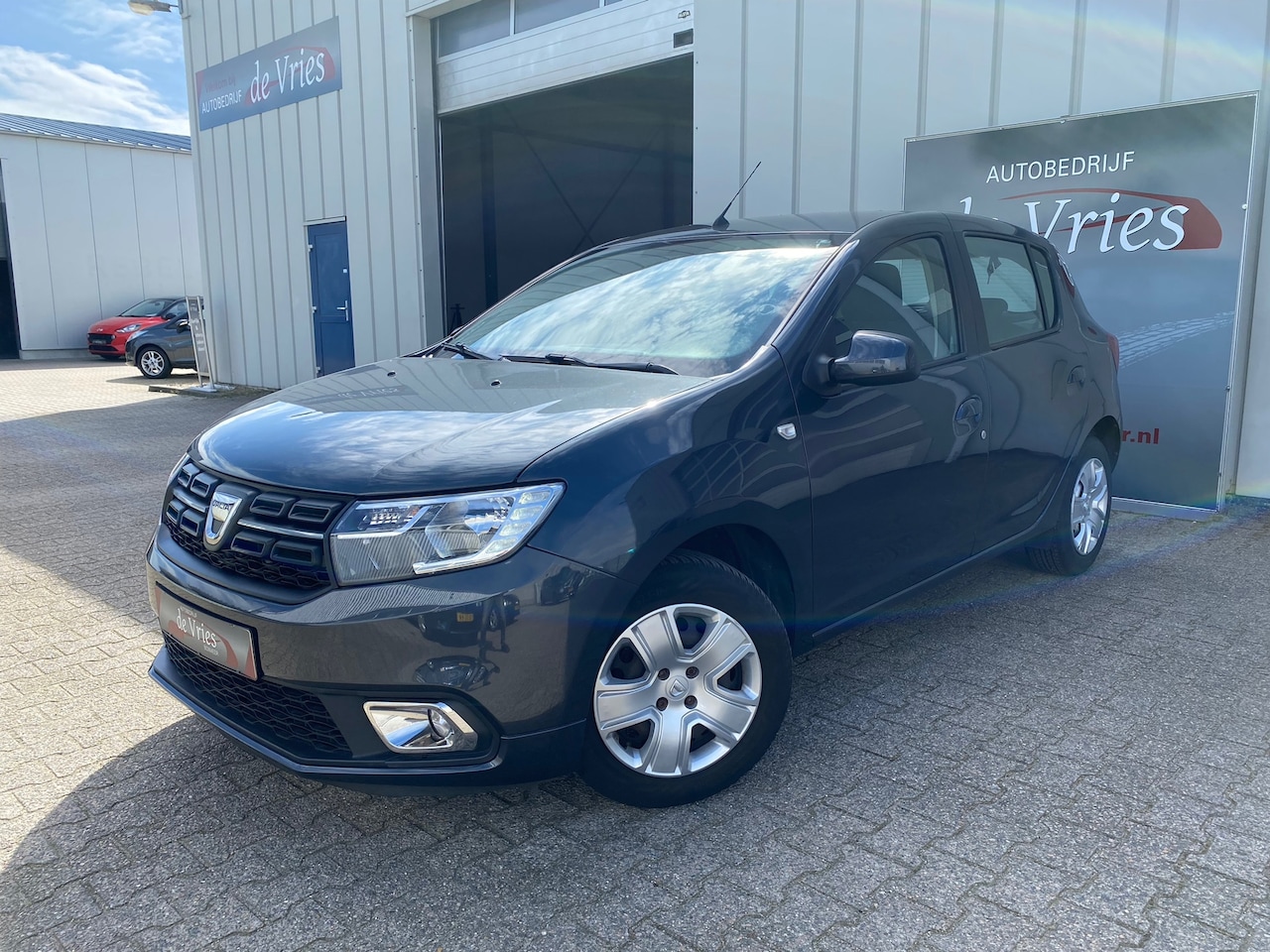 Dacia Sandero - 1.0 SCe Laureate / Airco / Cruise - AutoWereld.nl