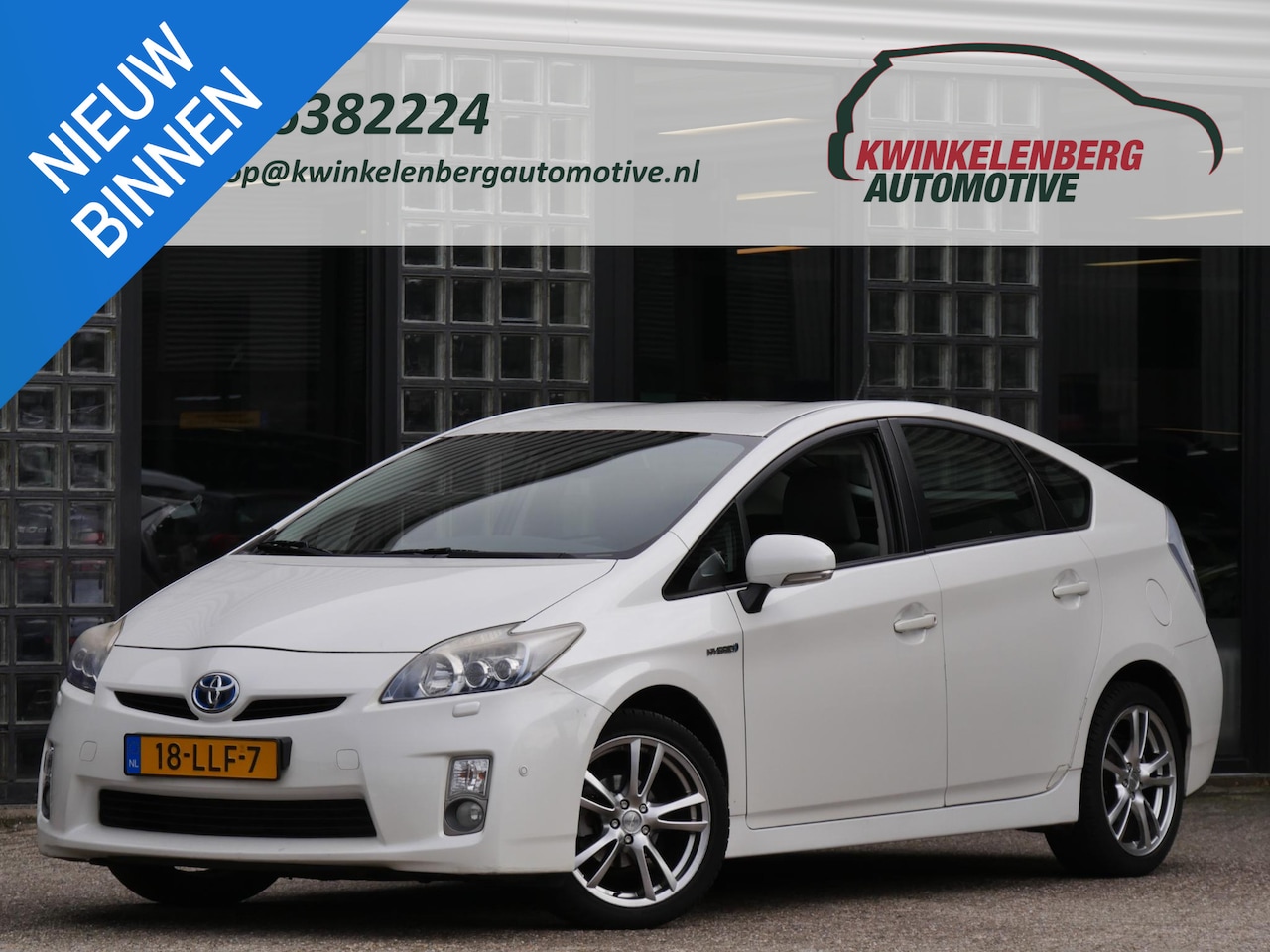 Toyota Prius - HYBRID DYNAMIC/ PEARL WHITE/ 100% TOYOTA ONDERHOUDEN - AutoWereld.nl