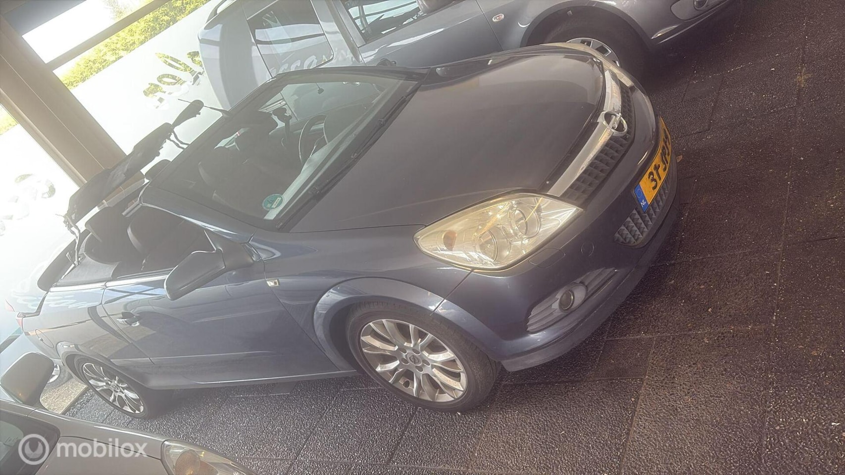 Opel Astra TwinTop - 1.8 Cosmo 1.8 Cosmo - AutoWereld.nl