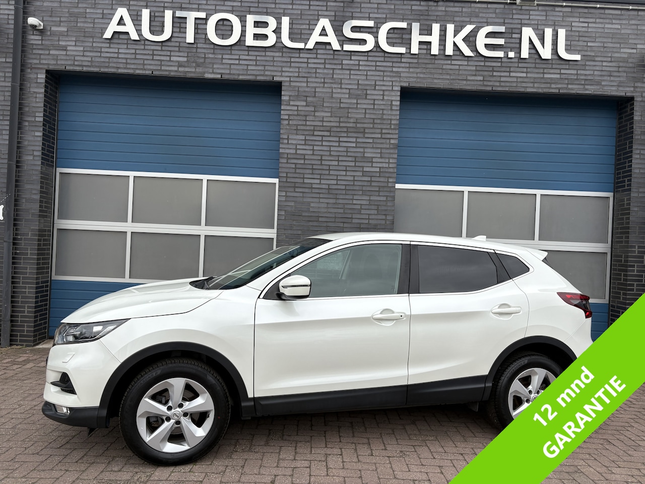 Nissan Qashqai - 1.2 N-Connecta 1.2 N-Connecta, climate/cruise/camera/trekhaak - AutoWereld.nl