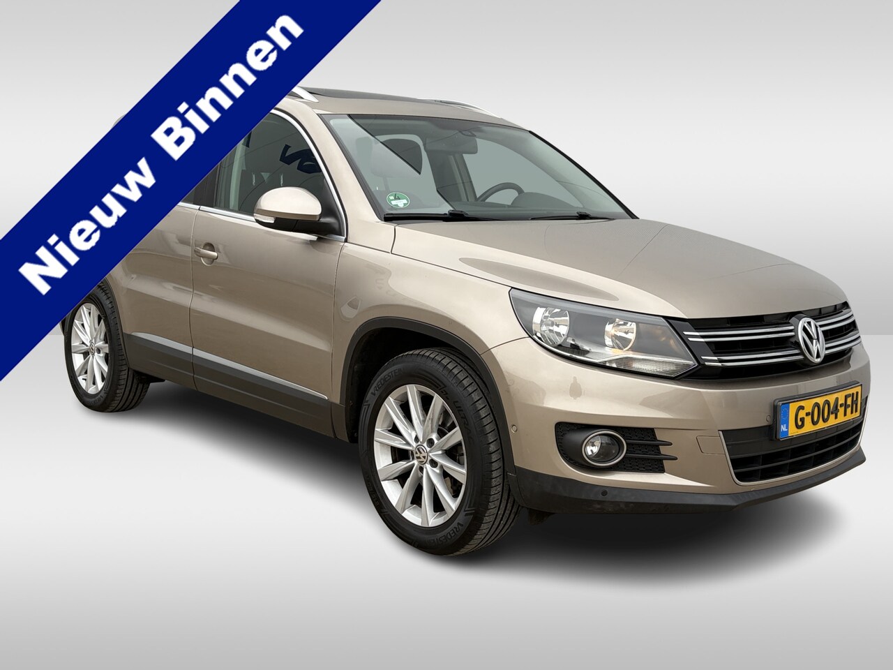 Volkswagen Tiguan - 1.4 TSI Sport&Style DSG - AutoWereld.nl