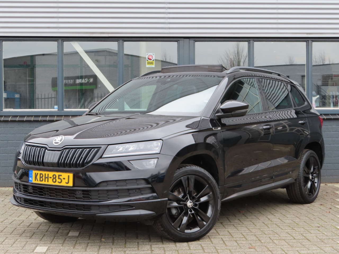Skoda Karoq - 1.5 TSI ACT Sportline Business DSG | pano dak | trekhaak wegklapbaar | canton soundsystem - AutoWereld.nl