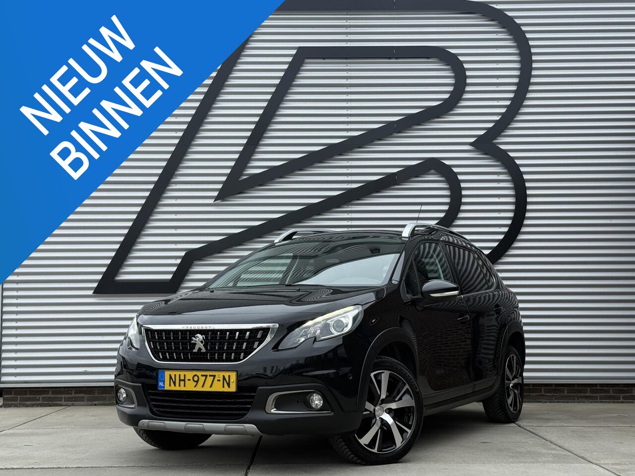 Peugeot 2008 - 1.2 PureTech Allure 2e Eigenaar|Navi|Camera|Clima|Cruise|Carplay|PDC V+A|D-riem vv in 2023 - AutoWereld.nl