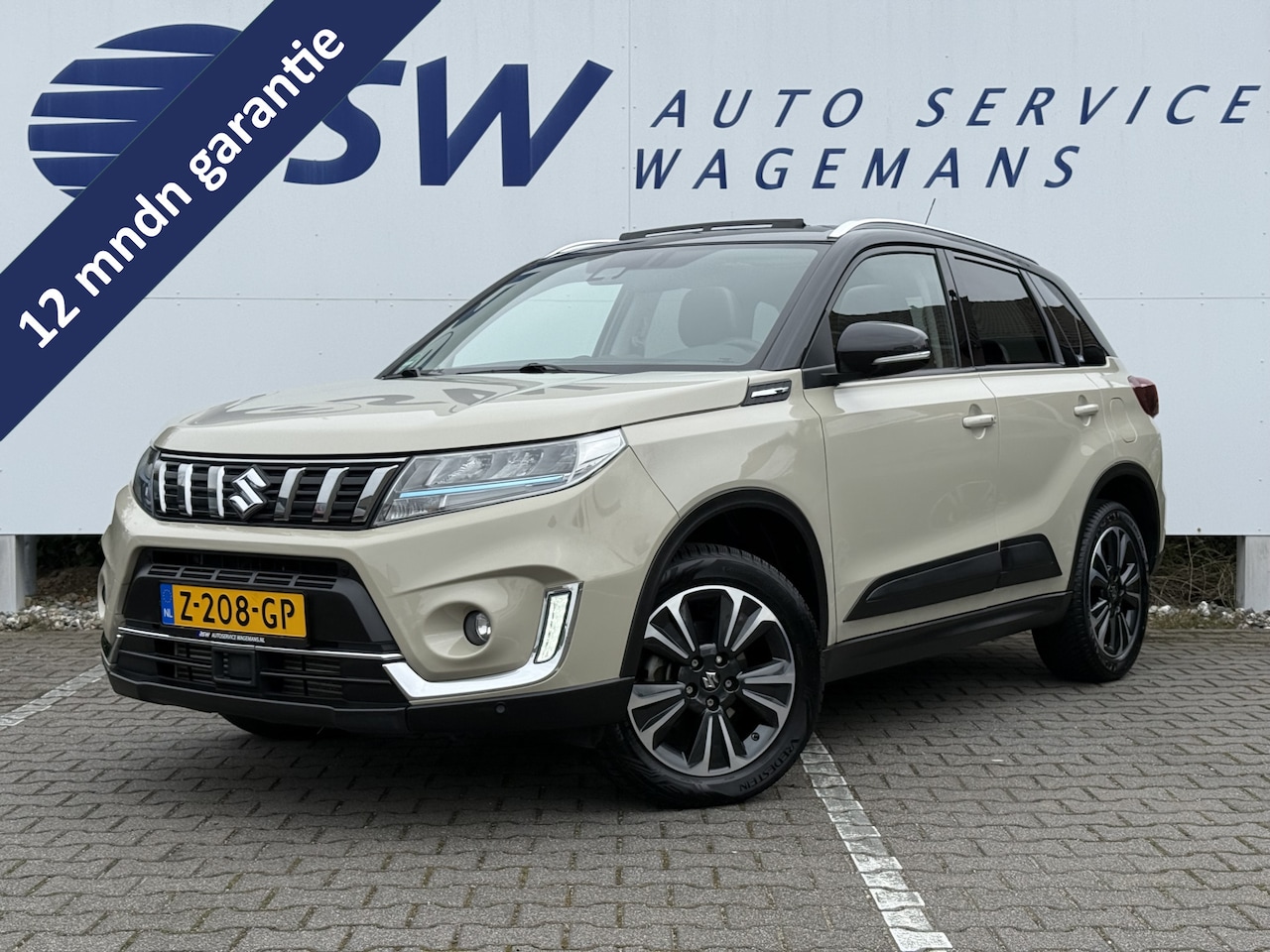 Suzuki Vitara - 1.4 Boosterjet Style Smart Hybrid AllGrip | Pano | ACC | Camera | Keyless | LED - AutoWereld.nl