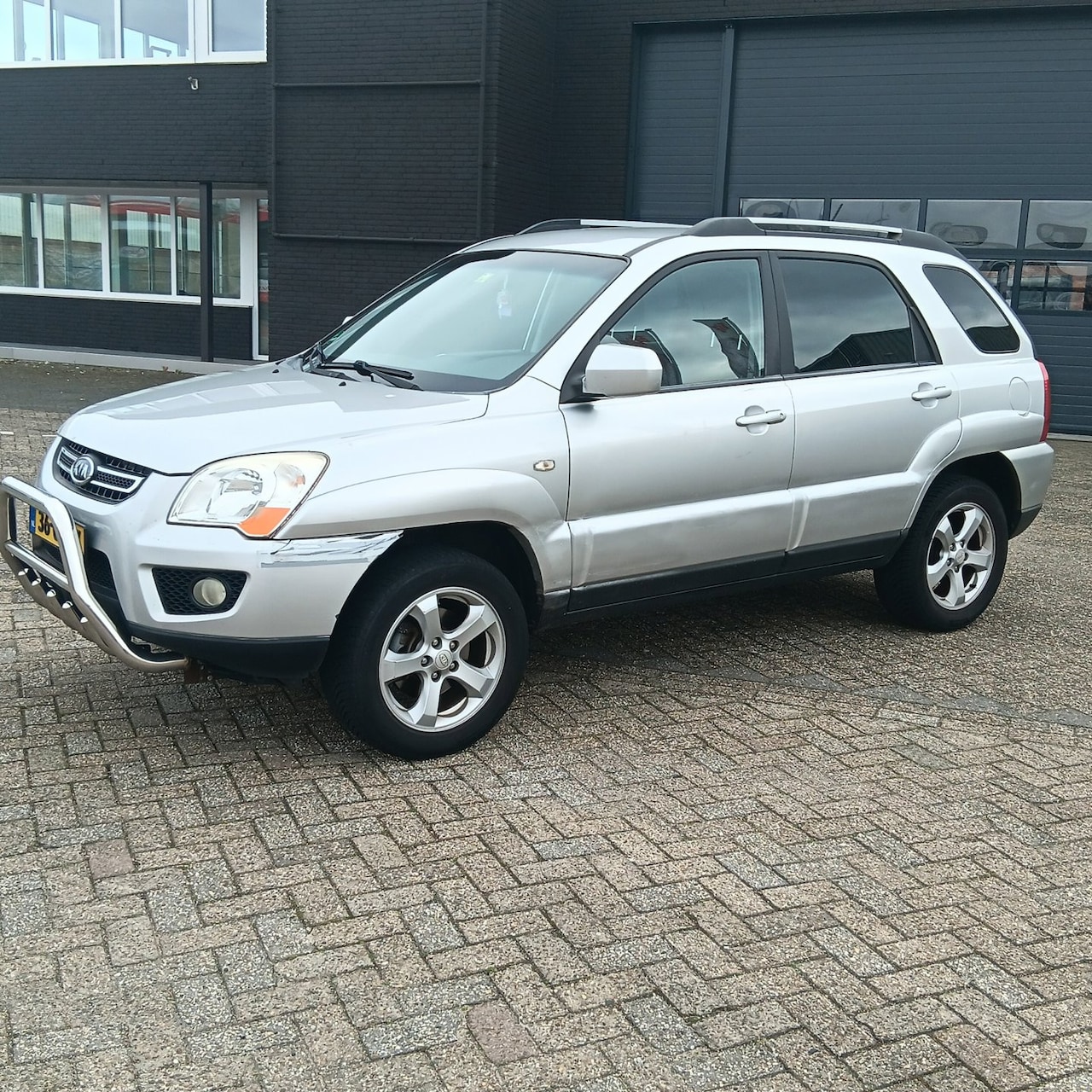 Kia Sportage - 2.0 CVVT X-tra 2.0 CVVT X-tra - AutoWereld.nl