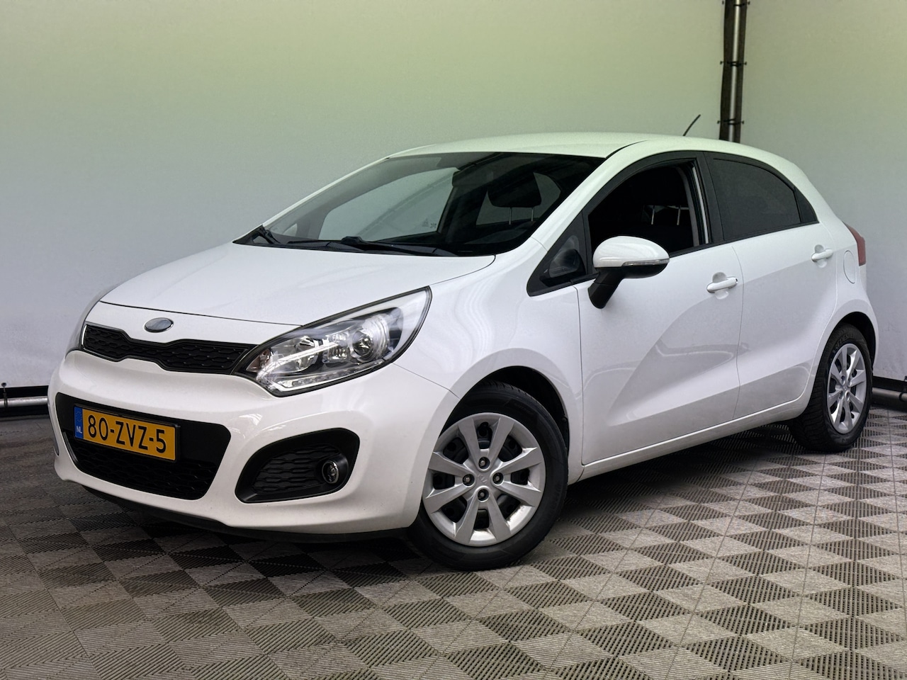 Kia Rio - 1.2 CVVT Plus Pack 5-drs Airco NL Auto - AutoWereld.nl