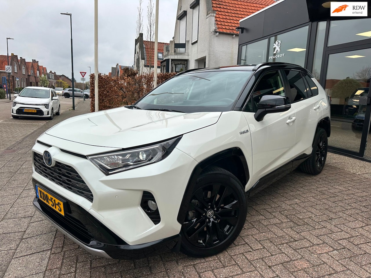 Toyota RAV4 - 2.5 Hybrid AWD Executive Bi-Tone|Leder|Apple CarPlay|19"LM - AutoWereld.nl