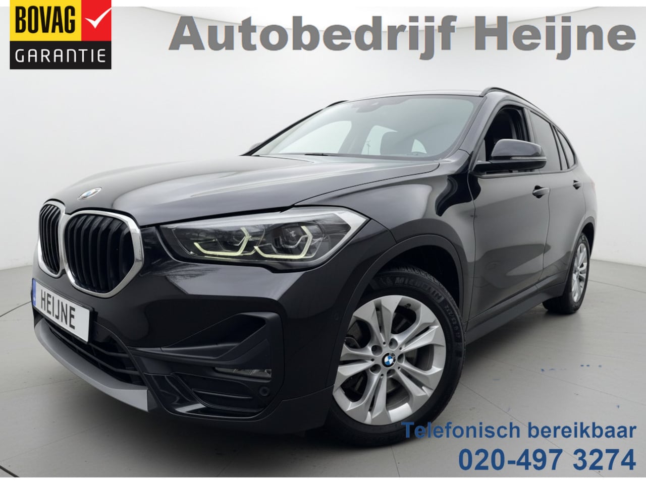 BMW X1 - xDrive25e HYBRIDE AUT. HIGH EXECUTIVE TREKHAAK/PDC/NAVIGATIE - AutoWereld.nl