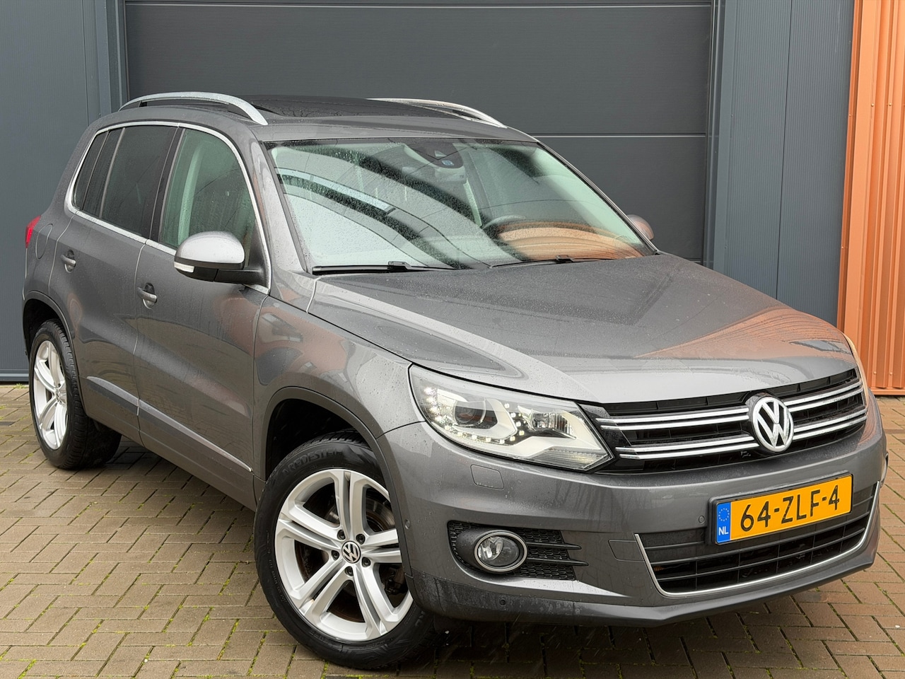 Volkswagen Tiguan - 1.4 TSI Sport&Style|100% onderhouden|Pano|Trekhaak|Climate Control|Cruise Control - AutoWereld.nl