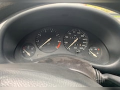 Opel Corsa - 1.2i-16V Strada Cool