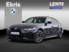 BMW i4 - M50 84 kWh / Schuif - Kanteldak / Harman Kardon / Elektrische Verstelbare Stoelen / M-Stoe
