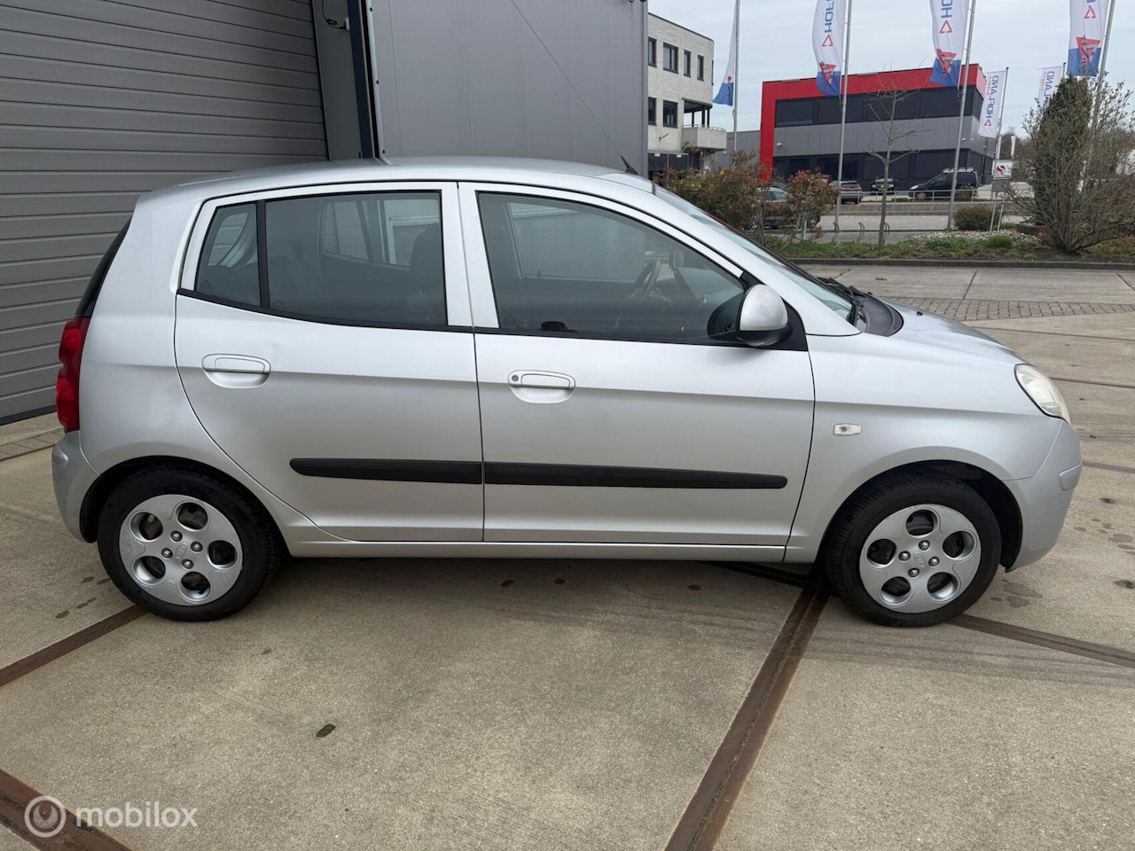 Kia Picanto - 1.1 X-tra First Edition Airco - AutoWereld.nl