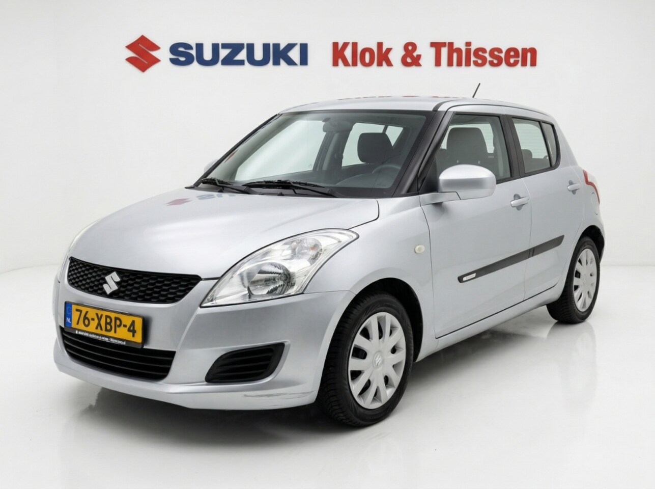 Suzuki Swift - Airconditioning 1.2 Comfort Stoelverwarming Stootlijsten Originele radio/CD - AutoWereld.nl