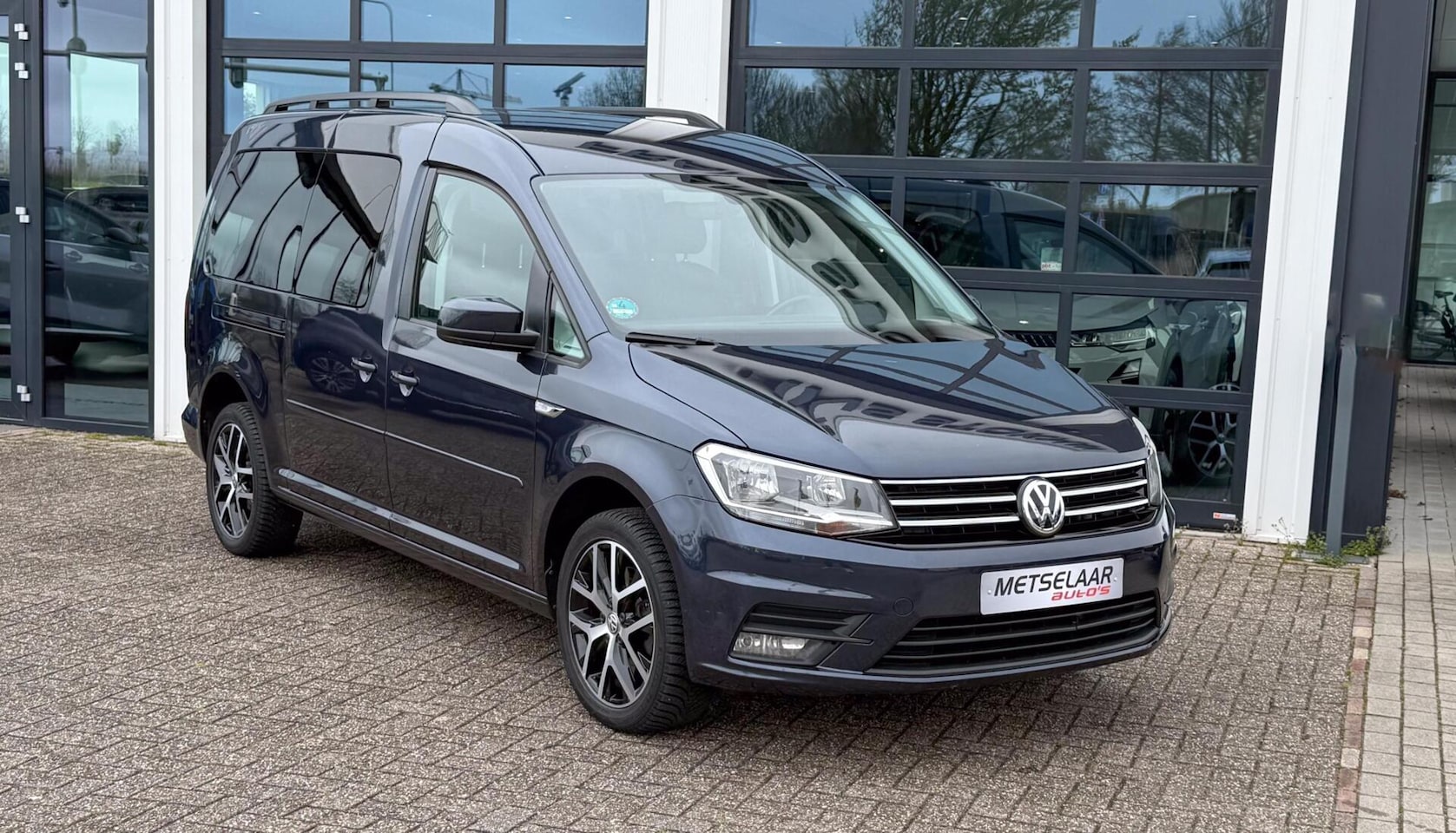 Volkswagen Caddy Maxi - 1.4 TSI ✅ Adapt cruise ✅ trekhaak ✅ navigatie - AutoWereld.nl