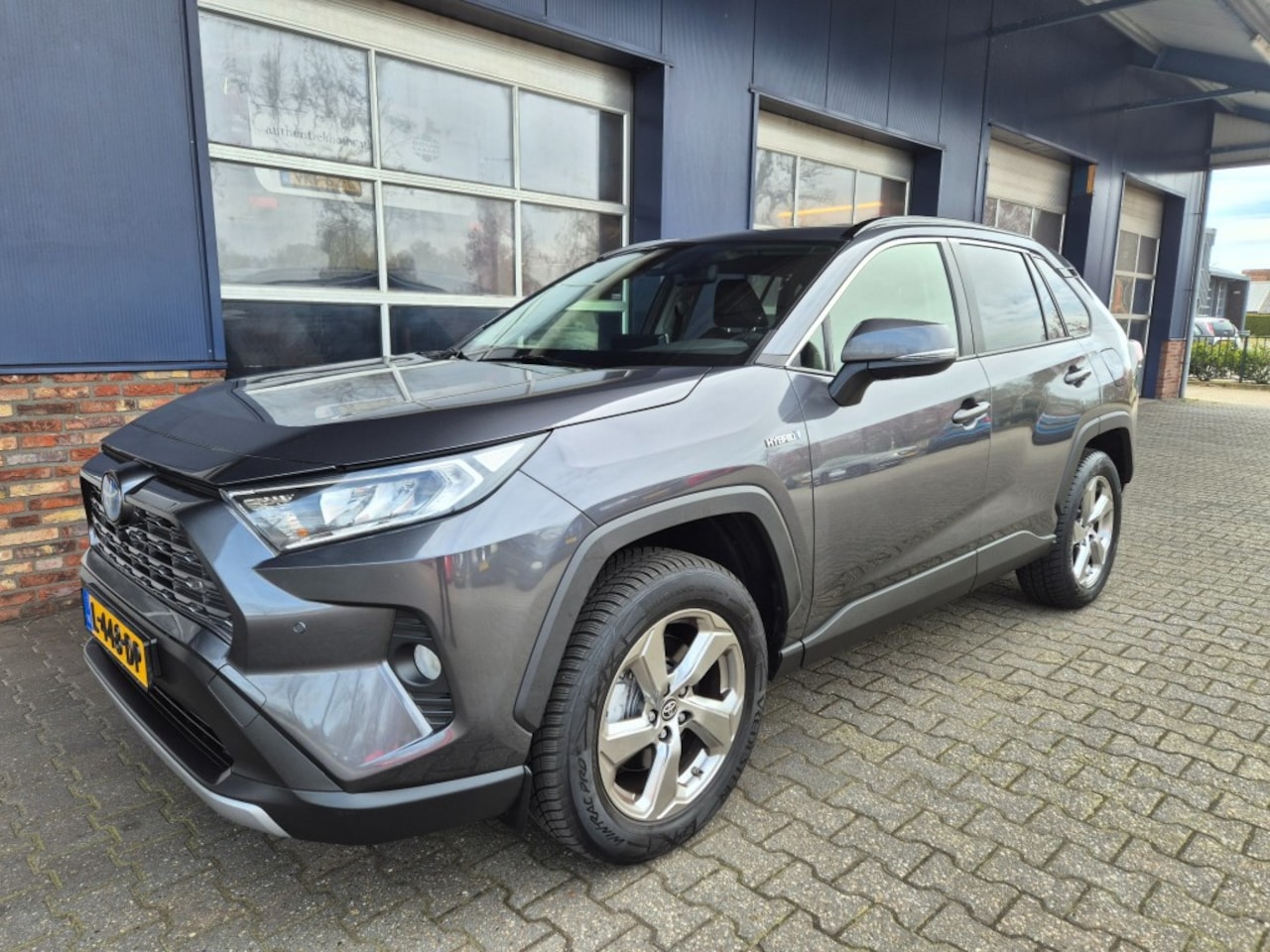 Toyota RAV4 - 2.5 HYBRID Bussines Plus, Camera, Carplay, Leer, Navi, Stoelverwarming, ALL IN Prijs! - AutoWereld.nl