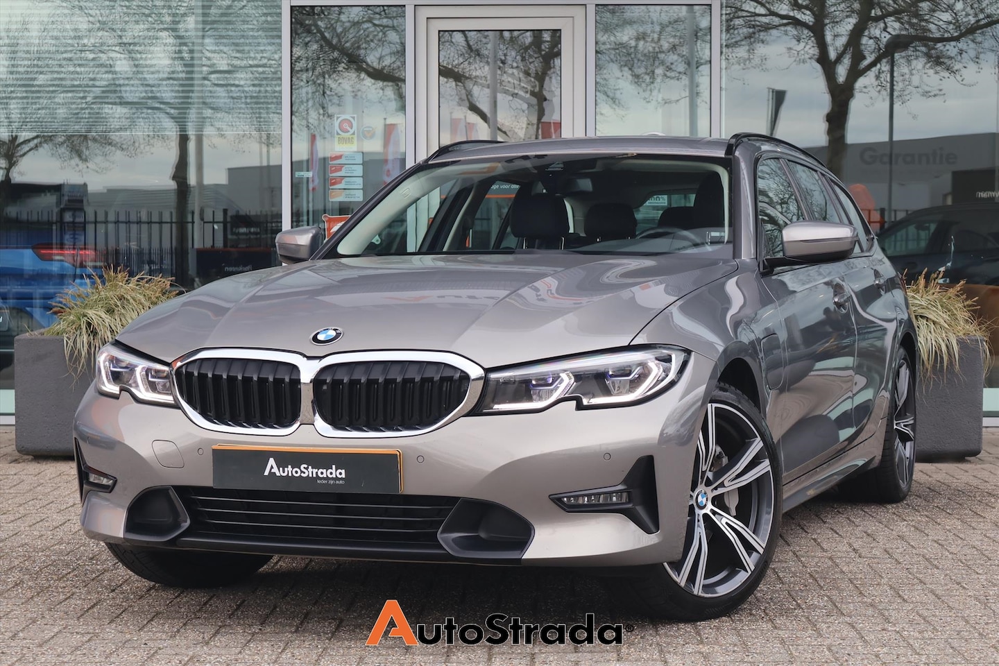 BMW 3-serie Touring - (g21) 330e High Executive 292pk | Leder | Stoelverwarming | Laser LED | Sfeer | Cruise | C - AutoWereld.nl