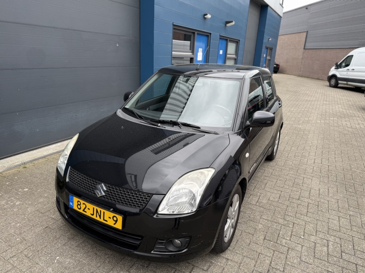 Suzuki Swift - 1.3 Bandit 5-Drs Airco Zwart Nwe APK en Koppeling!! - AutoWereld.nl