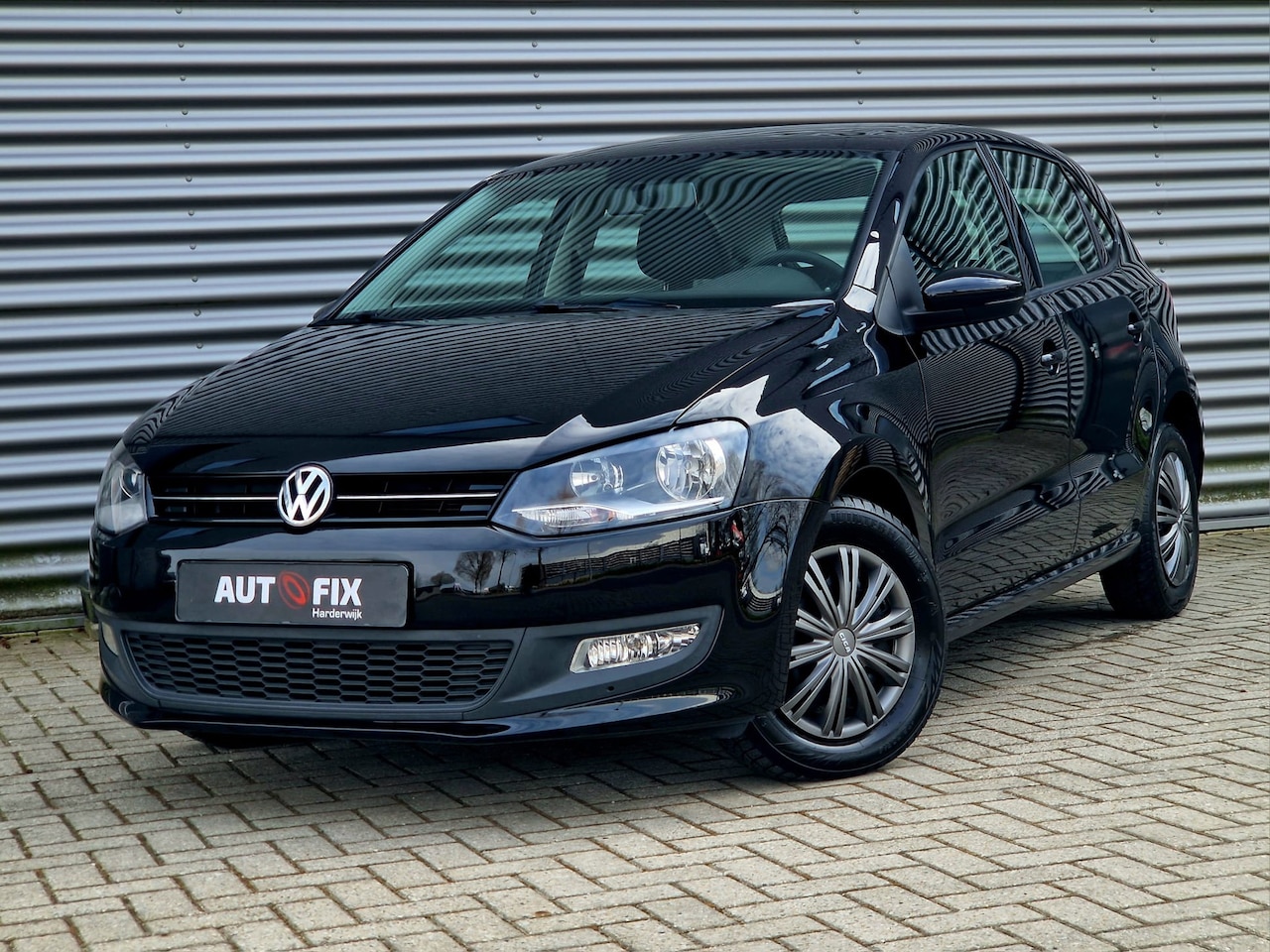 Volkswagen Polo - 1.2 TSI BlueMotion Comfortline Cruise / PDC / Airco - AutoWereld.nl