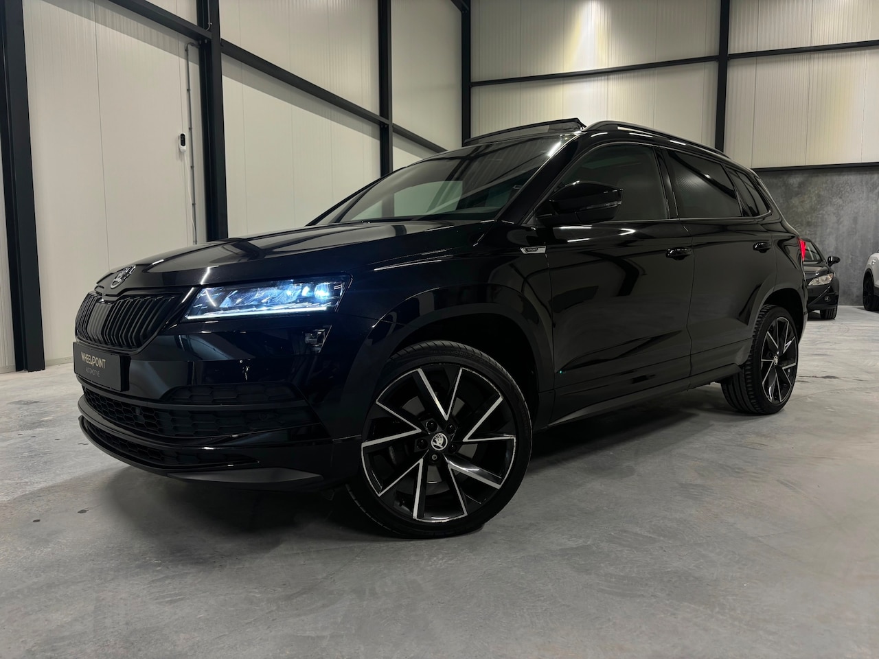 Skoda Karoq - Skoda Karoq 1.5 TSI DSG Sportline|Pano|Sfeer|Virtual|Cruise - AutoWereld.nl