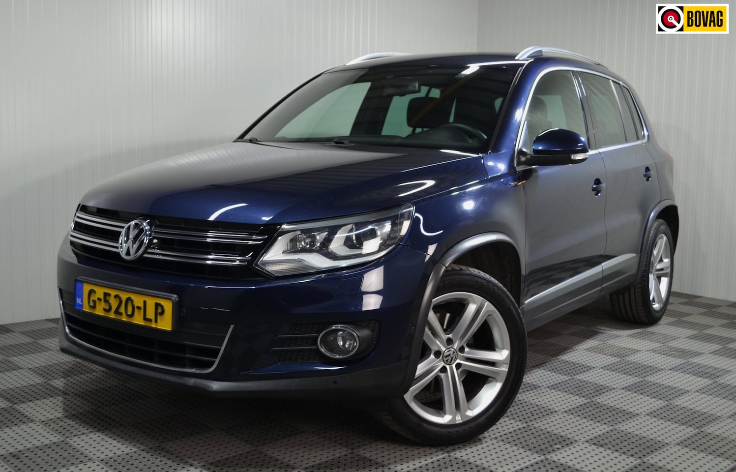 Volkswagen Tiguan - 1.4 TSI R-Line Edition / Trekhaak / Camera / Stoelverw./ Pdc / Navi. - AutoWereld.nl