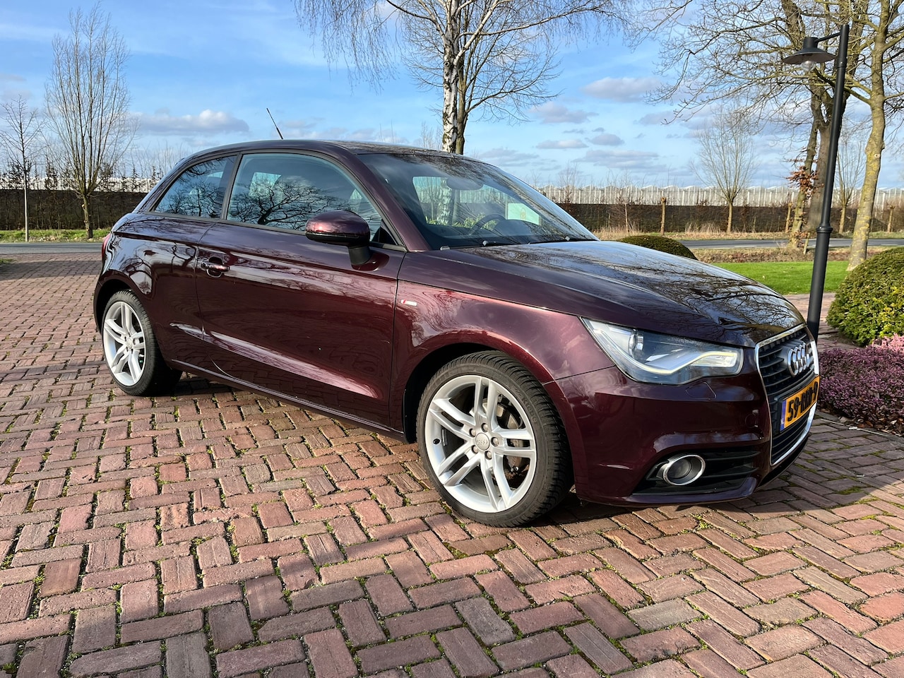 Audi A1 - 1.2 TFSI Ambition Pro Line Business Shiraz Red Metallic - Xenon - Navigatie - Climate Control - AutoWereld.nl