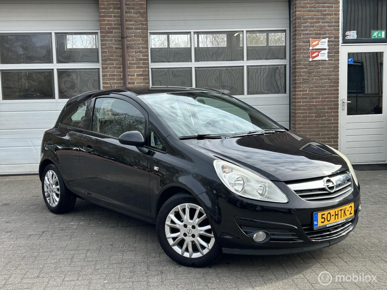 Opel Corsa - 1.4-16V Business | Airco | Cruise | Trekhaak - AutoWereld.nl