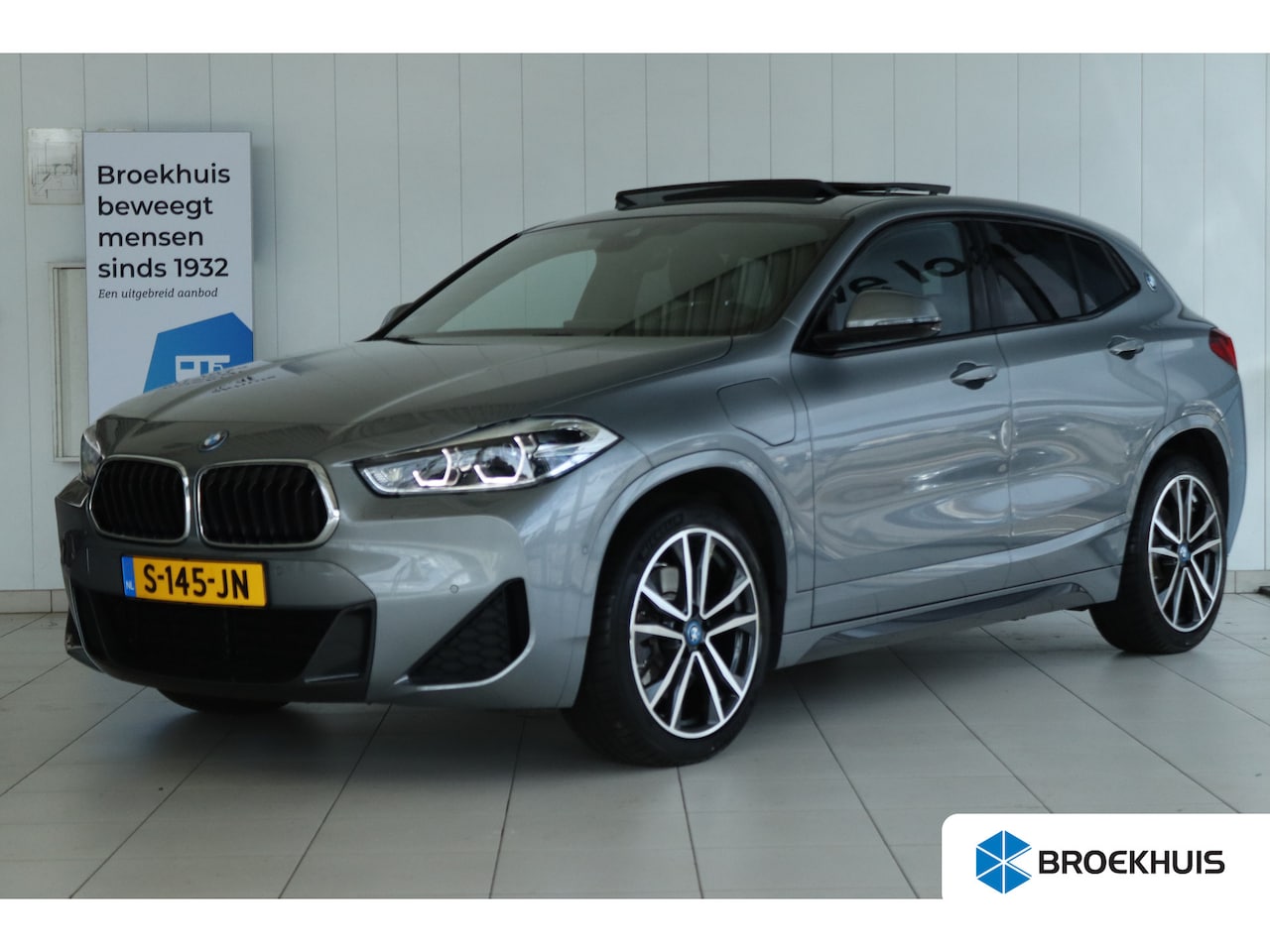 BMW X2 - xDrive25e High Executive | Adapt. Cruise | Camera | Schuifdak | HUD| Stoelverwarming | Ele - AutoWereld.nl