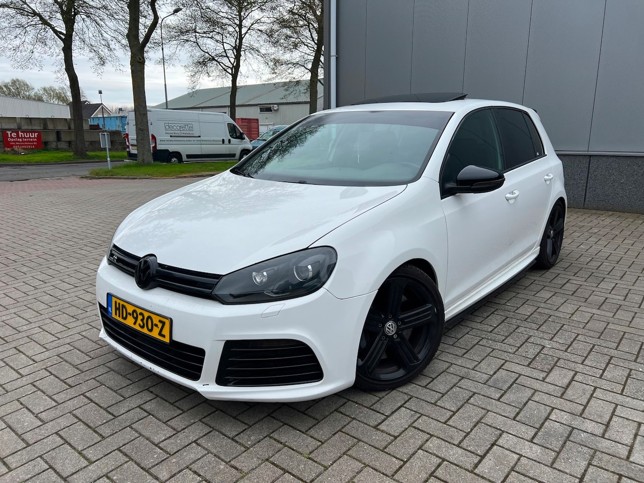 Volkswagen Golf - 2.0 TSI R 4Motion Schuifdak Soundbox - AutoWereld.nl