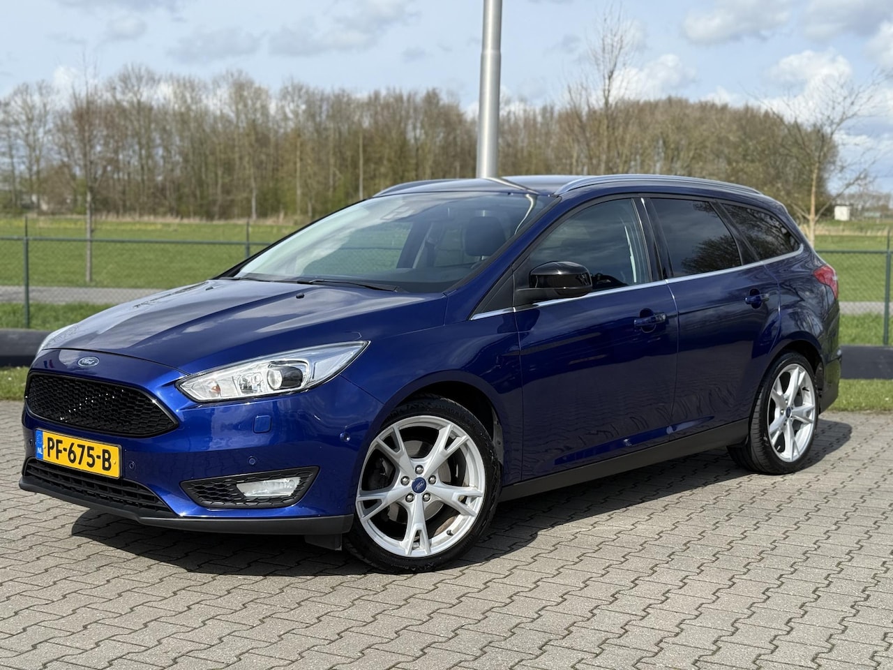 Ford Focus Wagon - 1.5 Titanium Edition |CRUISE|PDC|NAVI|STOEL.VERVARM|TOP STAAT ! - AutoWereld.nl