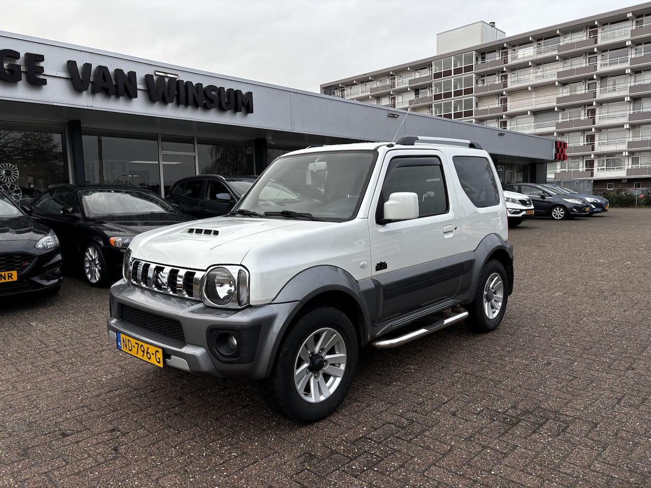 Suzuki Jimny - 1.3 Exclusive 4x4 Pilot limited edition by GMT Airco Lmv Parelmoerwit 4WD Trekhaak - AutoWereld.nl