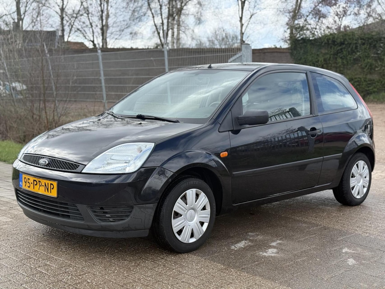 Ford Fiesta - 1.3 Style LAAG KM NAP RIJD PERFECT - AutoWereld.nl