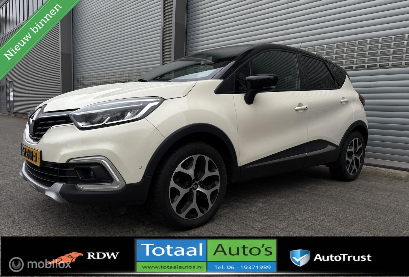 Renault Captur - 1.2 TCe Intens*BI-TONE*CRUISE*NAV*P-SEN*P-CAM - AutoWereld.nl