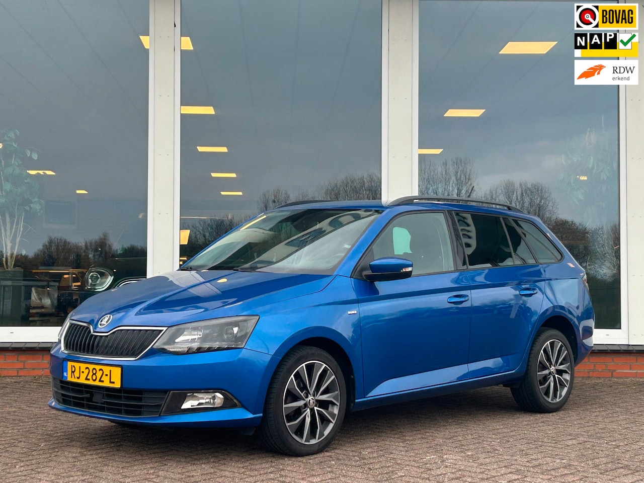 Skoda Fabia Combi - 1.0 TSI Drive - Origineel NL - NAP - Navi - Clima - PDC - LM - AutoWereld.nl