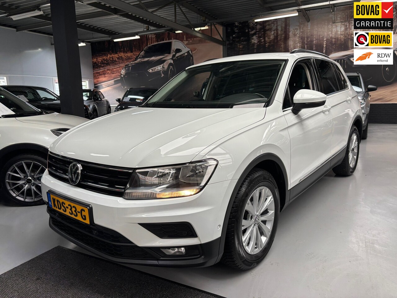 Volkswagen Tiguan - 1.5 TSI ACT Comfortline Business / Camera / Stoel+stuur verwarming - AutoWereld.nl