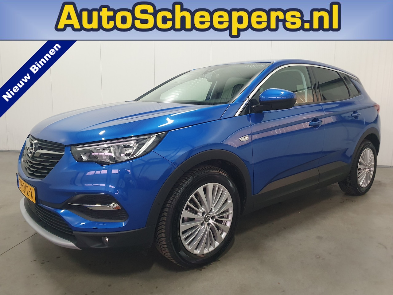 Opel Grandland X - 1.6 Turbo Innovation NAVI/H.LEDER/CARPLAY/CAMERA/TRHAAK - AutoWereld.nl
