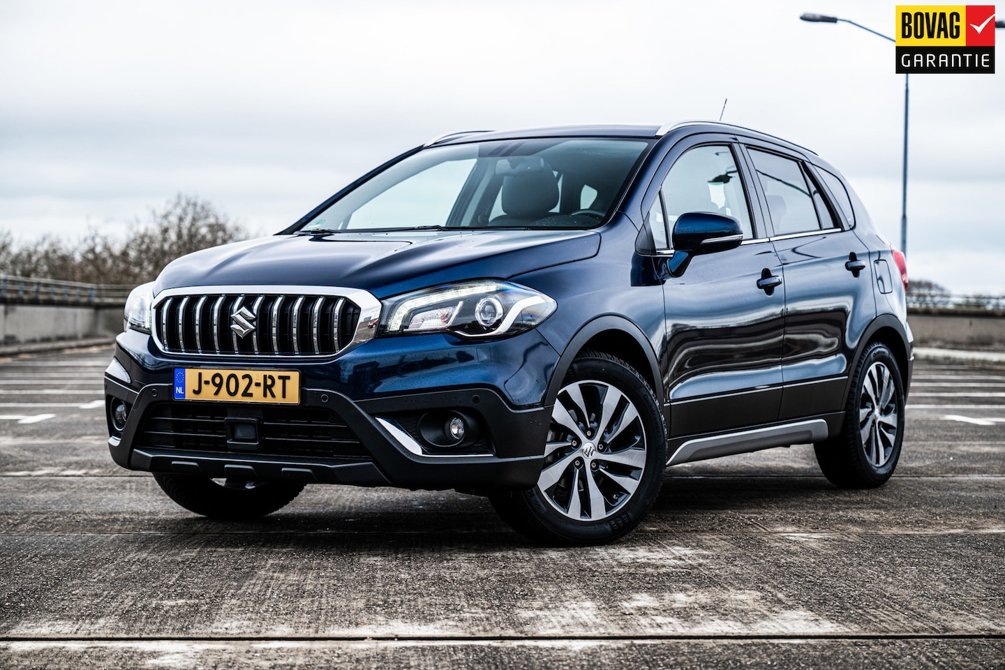 Suzuki S-Cross - 1.4 Boosterjet AllGrip Style Smart Hybrid | Airco/Clima | Adaptive Cruise Control | Camera - AutoWereld.nl